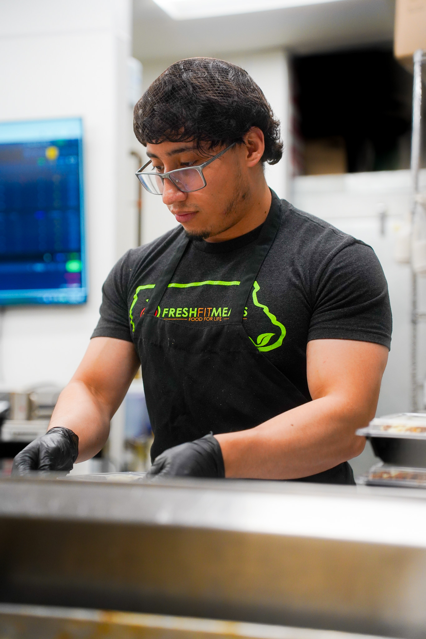 Fresh Fit Meals kitchen team member